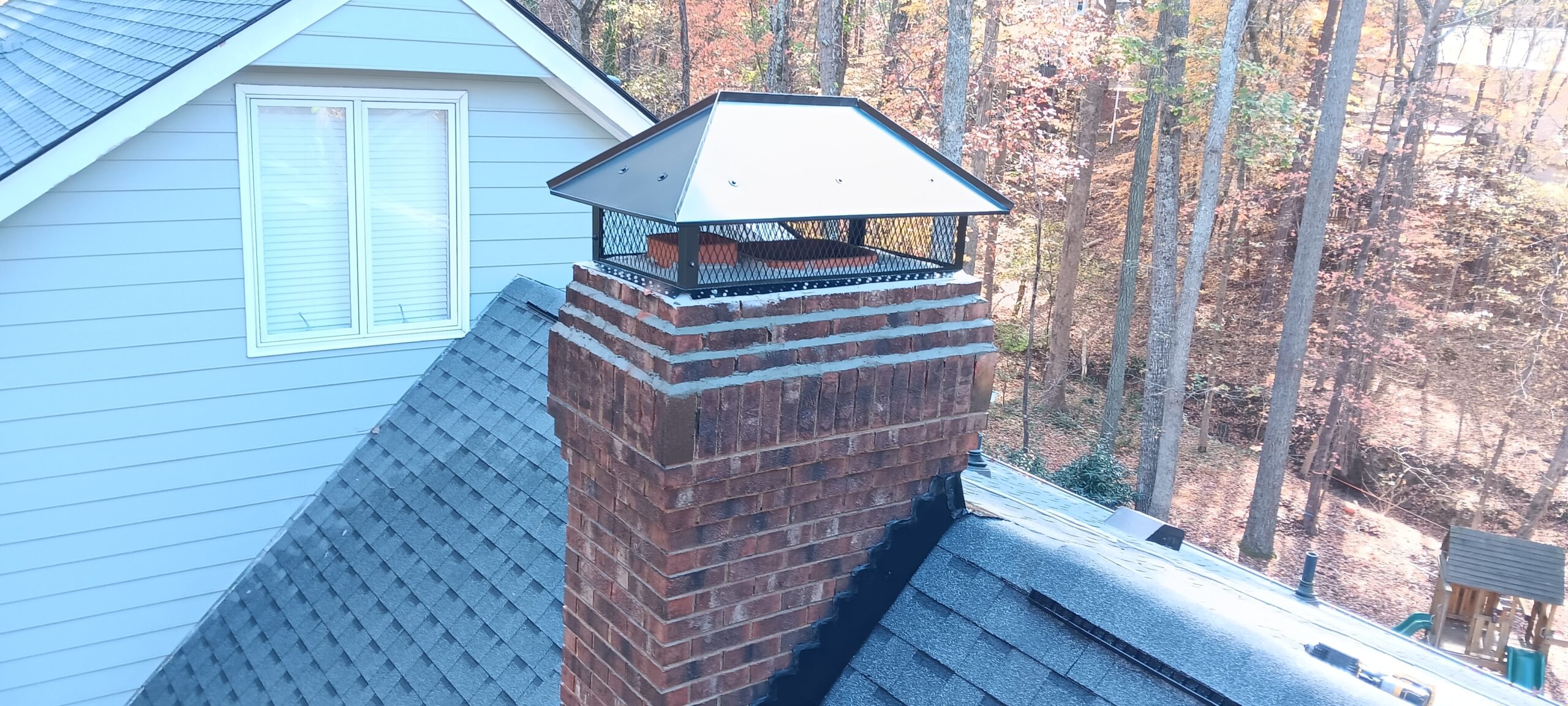 customer chimney cap with hip and ridge lid